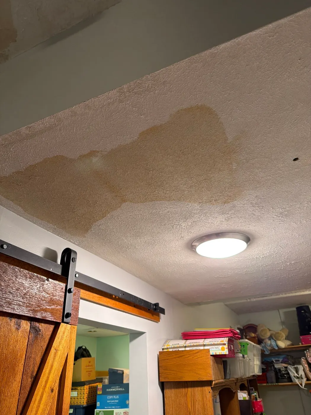 Certified restoration crew at work on Sycamore Park residence